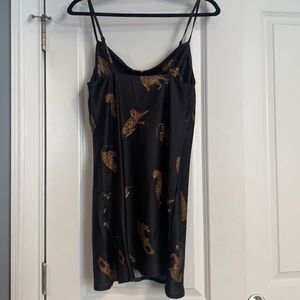 Princess Molly Black dress with leopards on it.